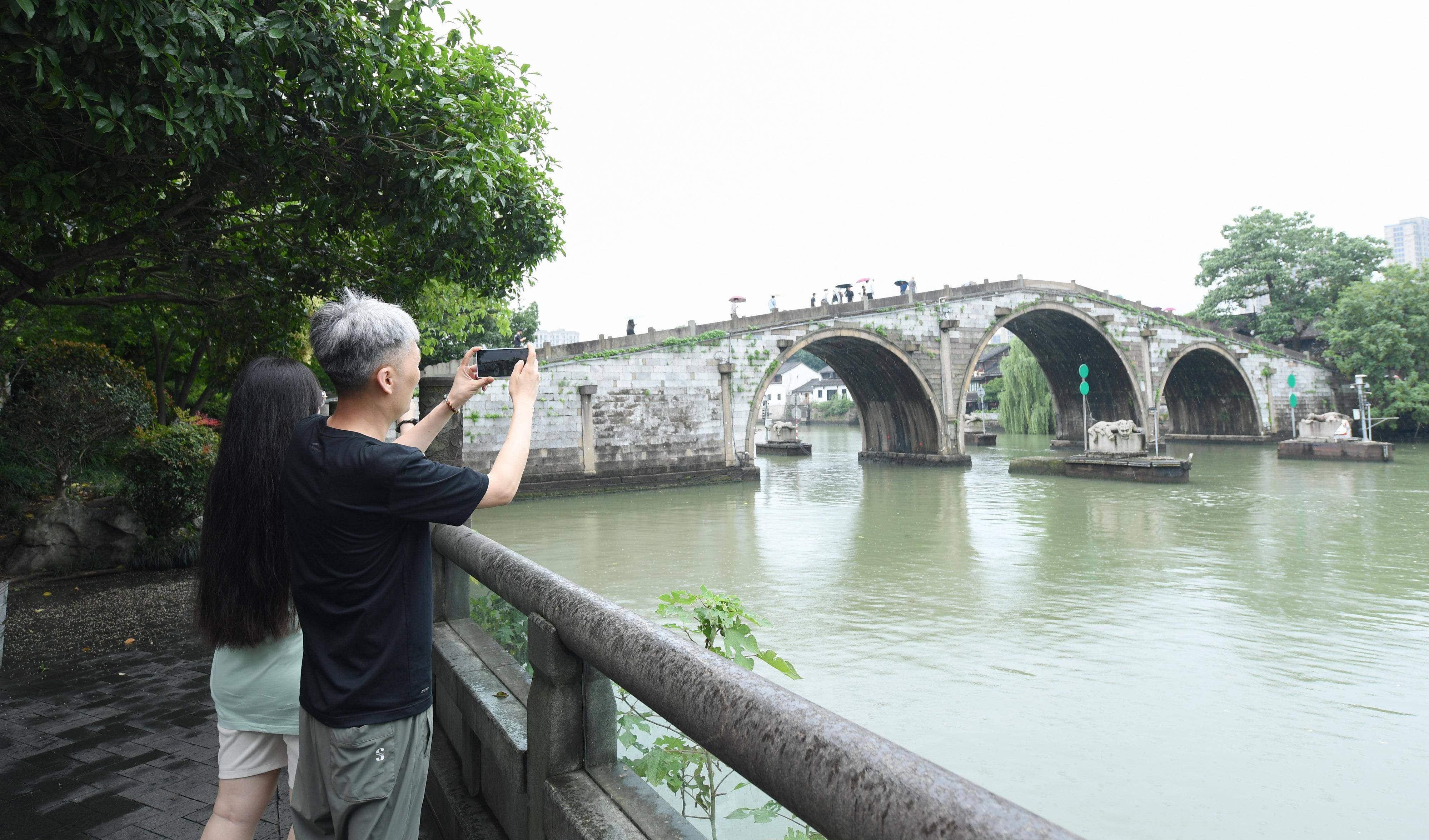 新华全媒+·中国大运河申遗成功十周年｜在京杭大运河南端来场“City Walk”  第4张